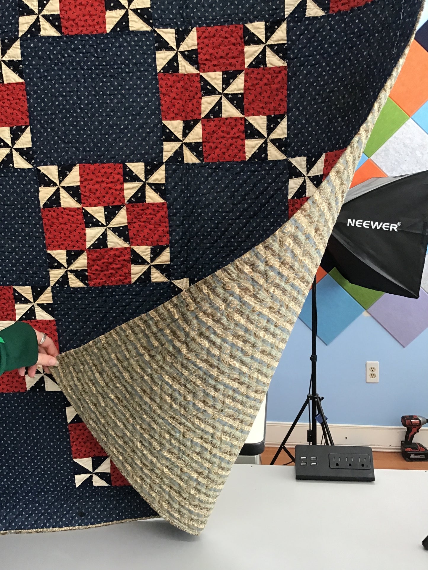 Blue pinwheel with red 9 patch