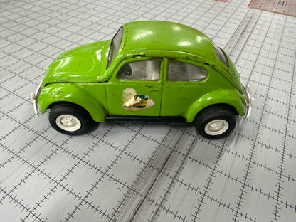vintage 1970s green Tonka Volkswagen "Side Winder" Beetle pressed-metal toy car