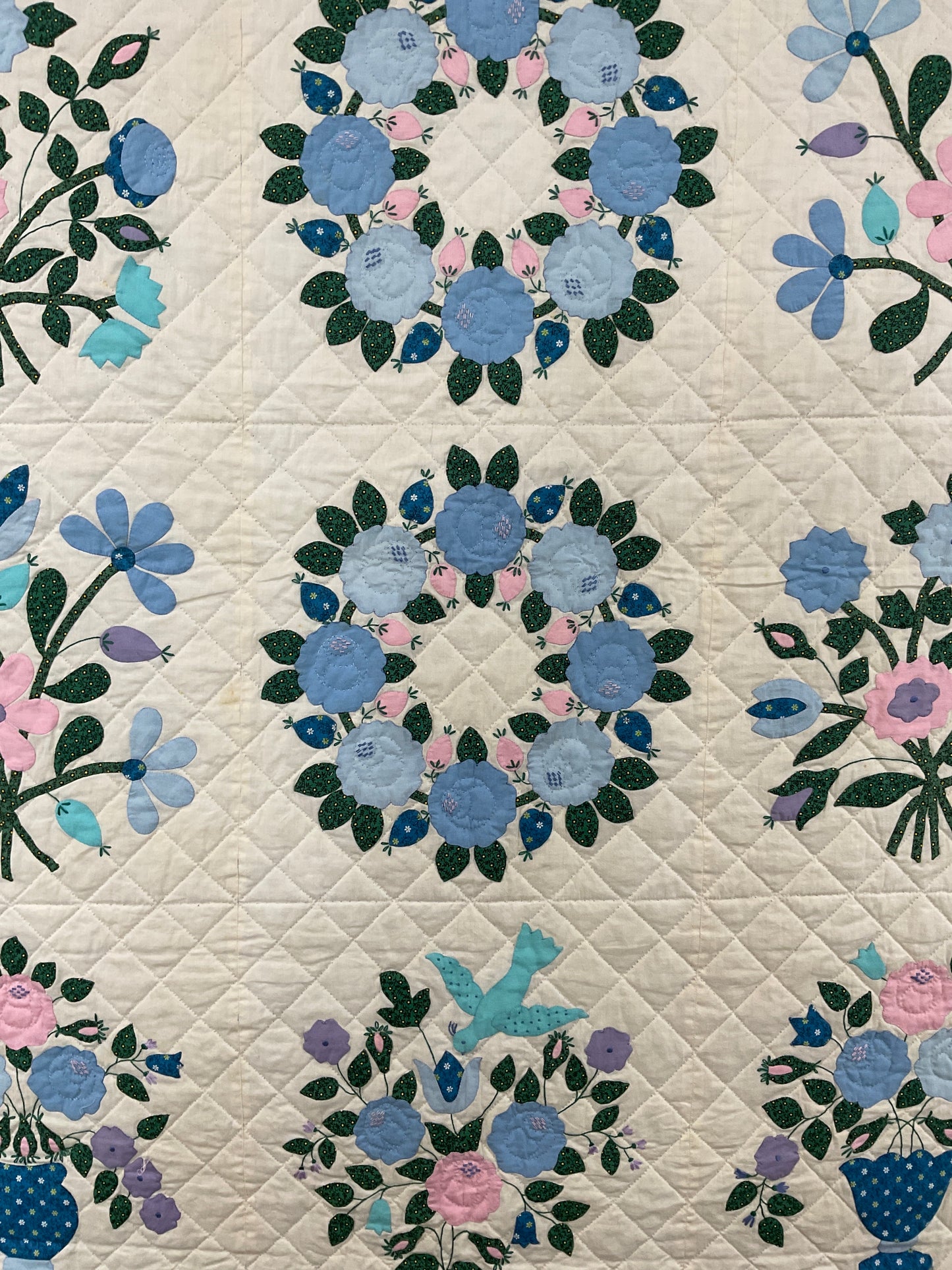 Vintage appliqué quilt