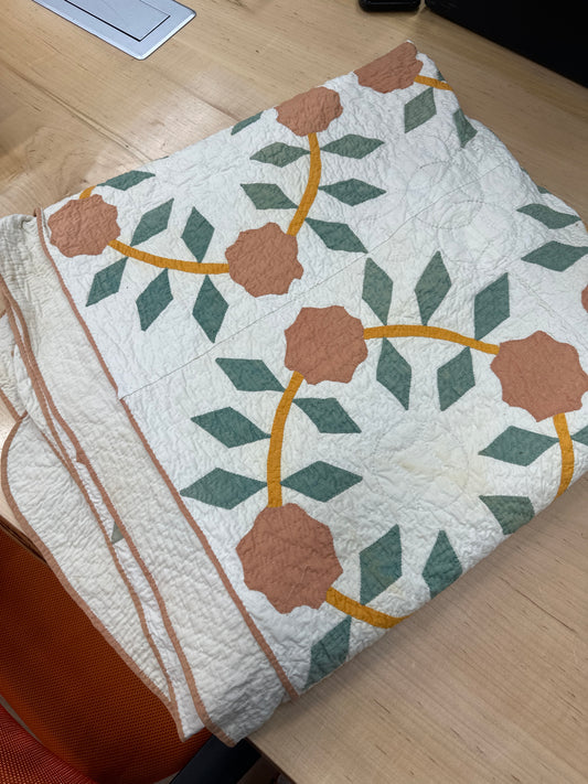 Antique floral appliqué quilt