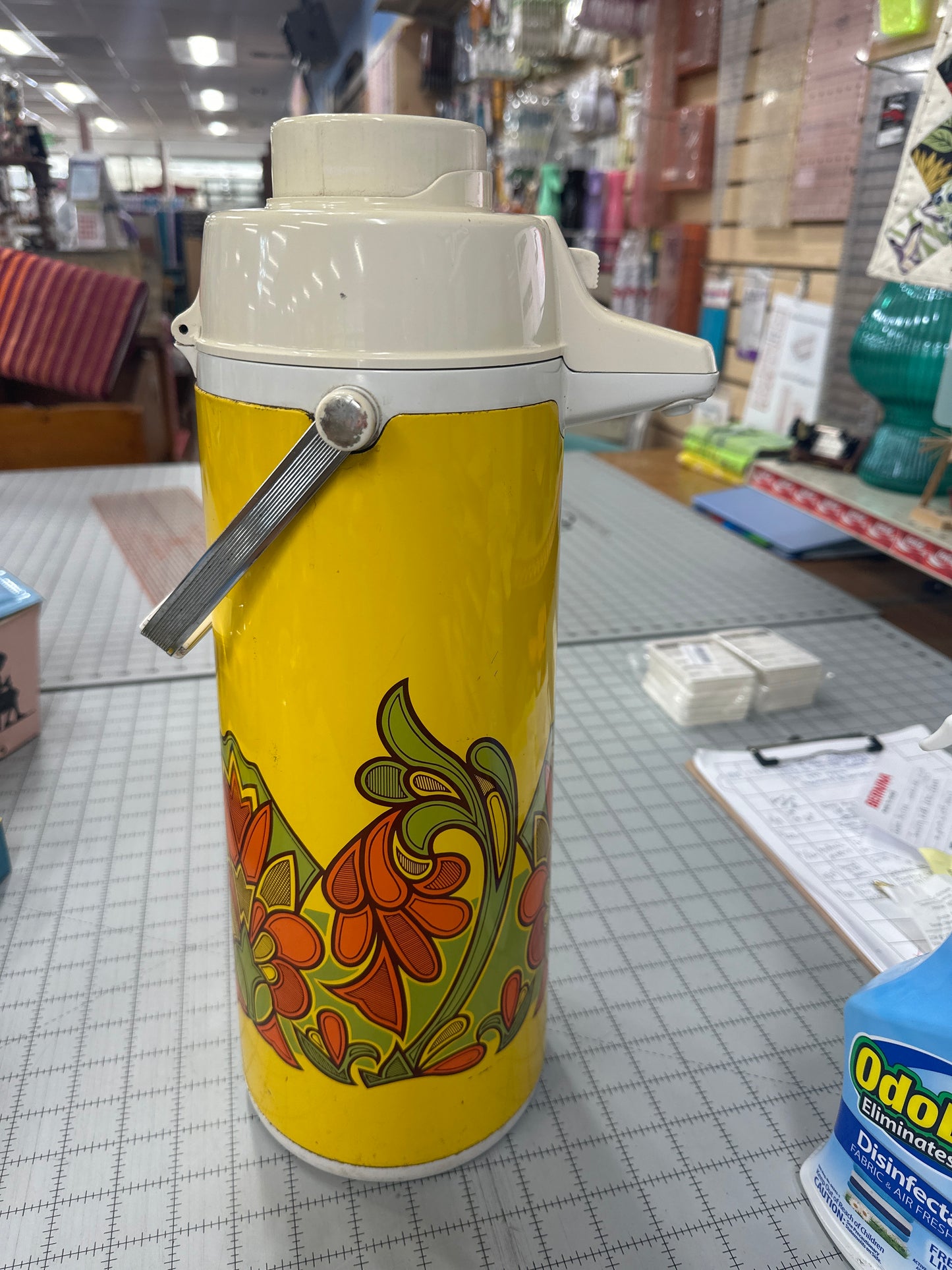 Vintage yellow and white Peacock Vacuum Bottle Company beverage dispenser