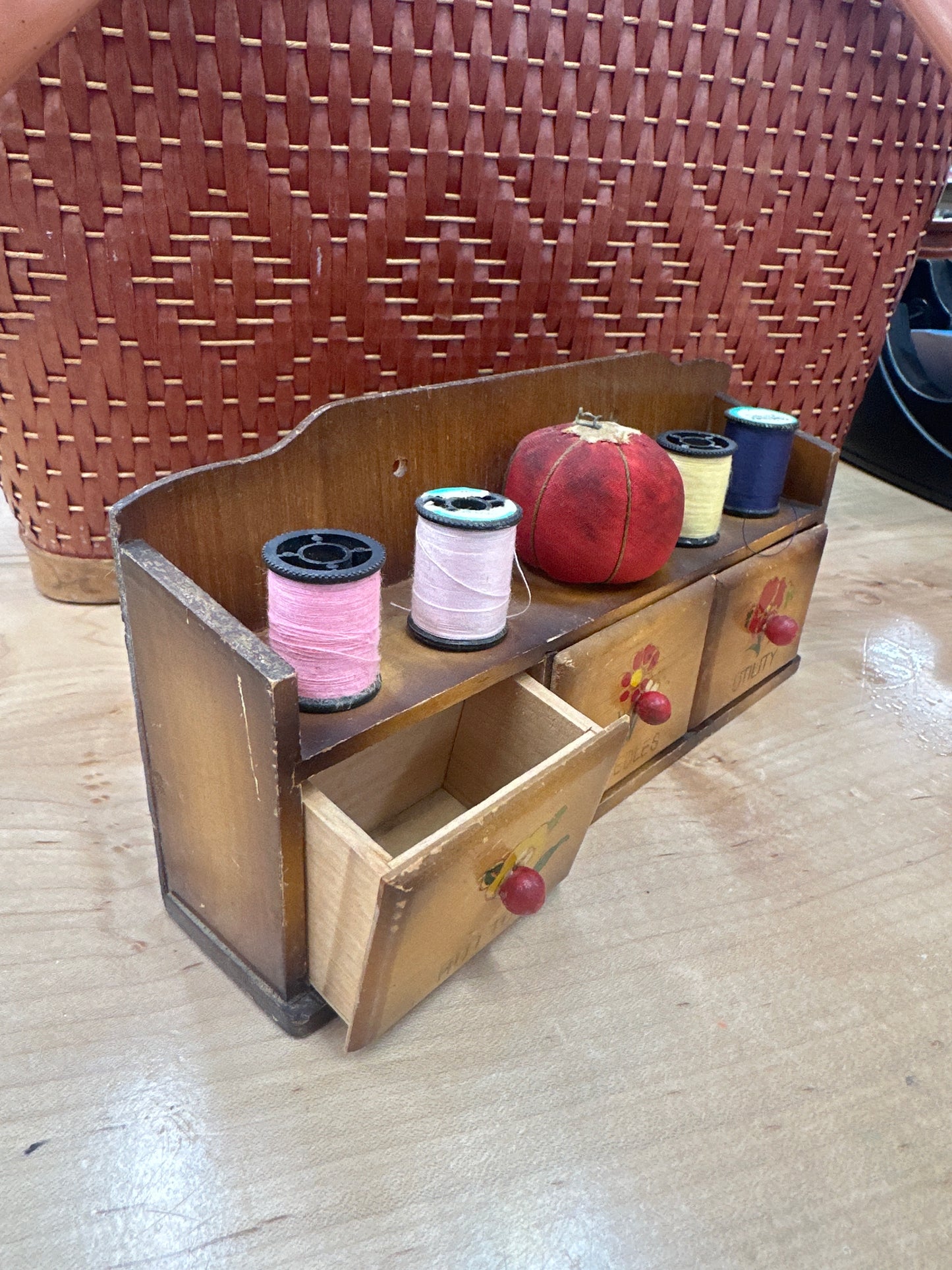 Vintage sewing notions display