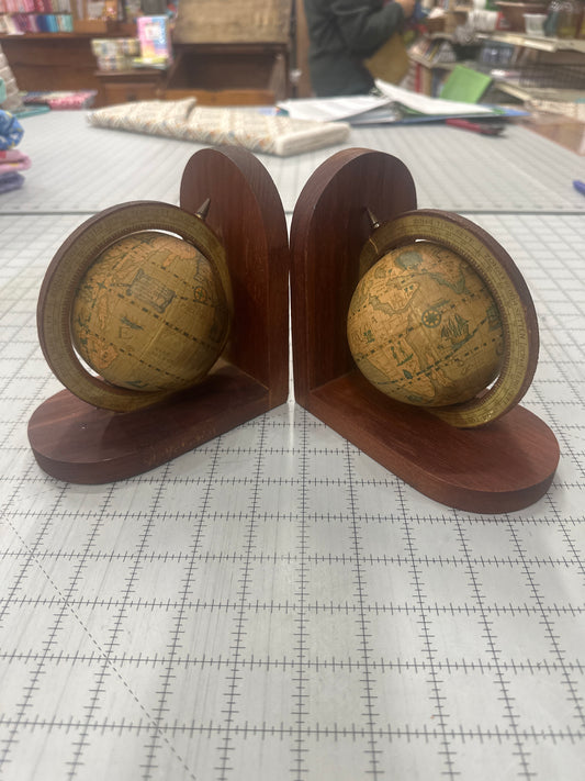 Vintage wooden globe bookends. "Old World" style. Pair