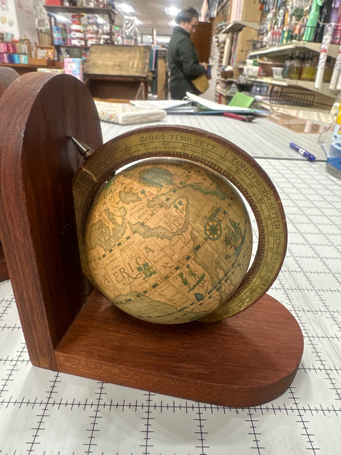 Vintage wooden globe bookends. "Old World" style. Pair