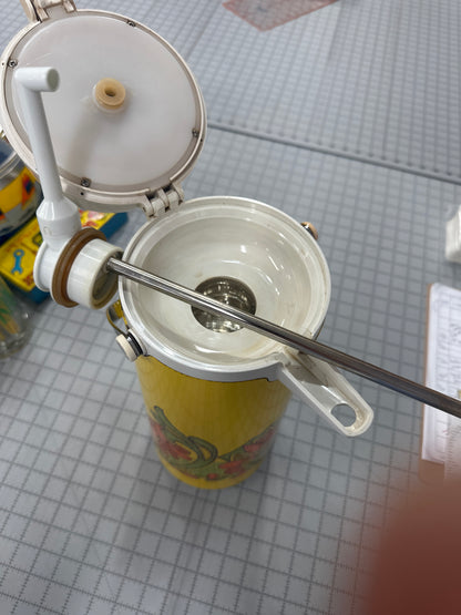 Vintage yellow and white Peacock Vacuum Bottle Company beverage dispenser