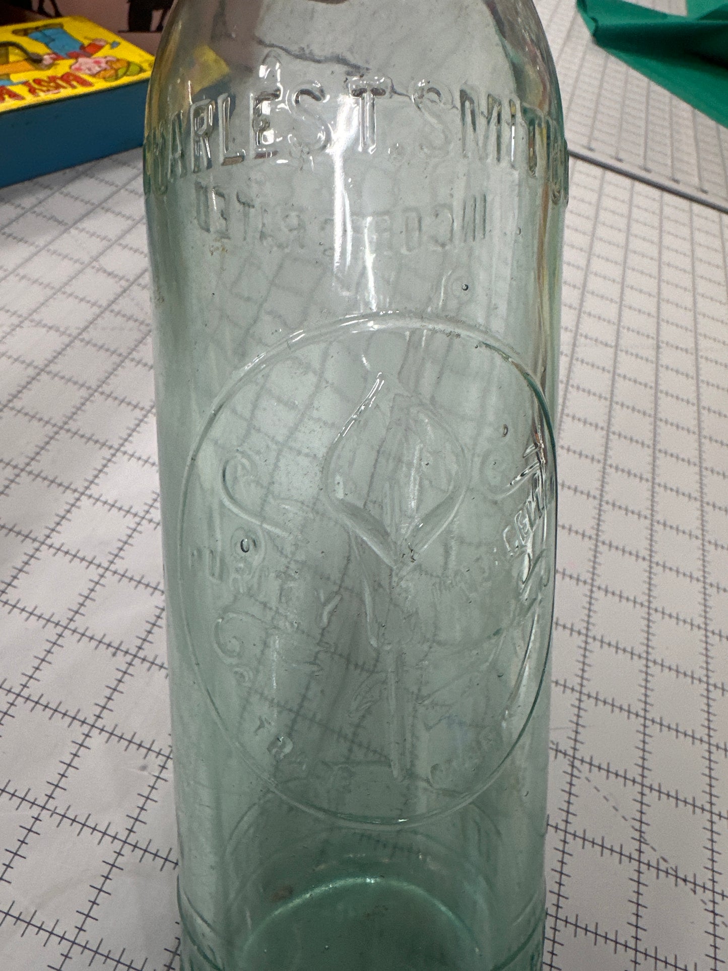 Antique, aqua-colored, blob-top bottle from S. Michelsohn in Belmar, New Jersey. Late 1800s