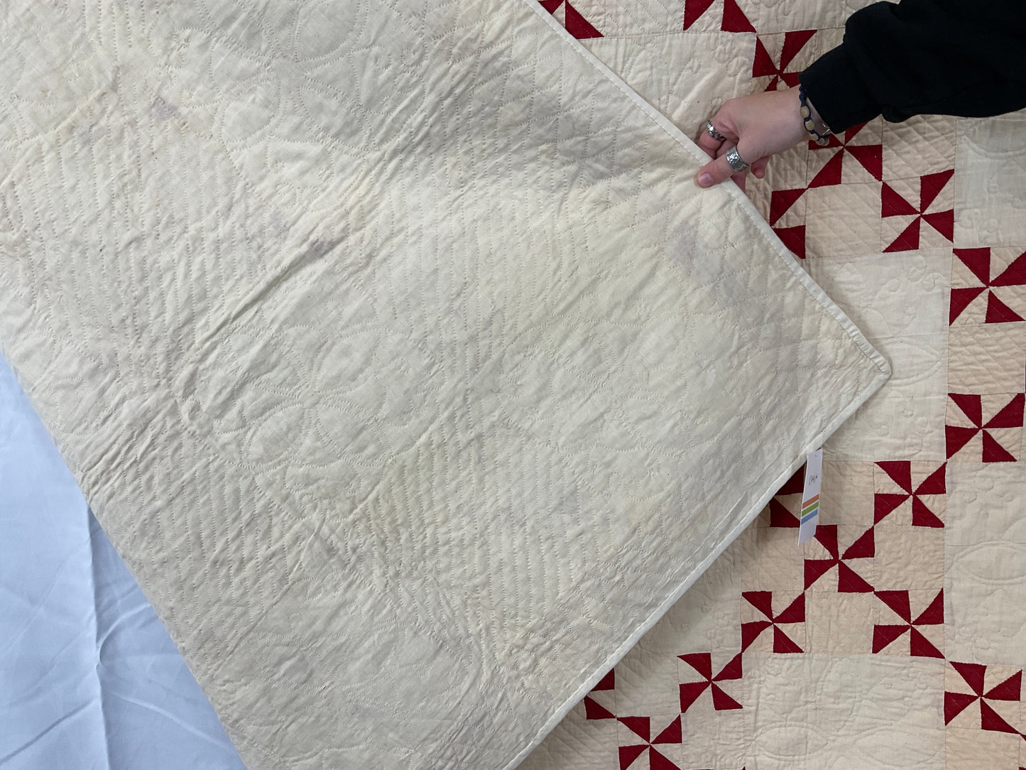 Red and cream pinwheel quilt