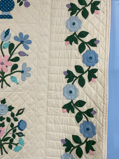 Vintage appliqué quilt