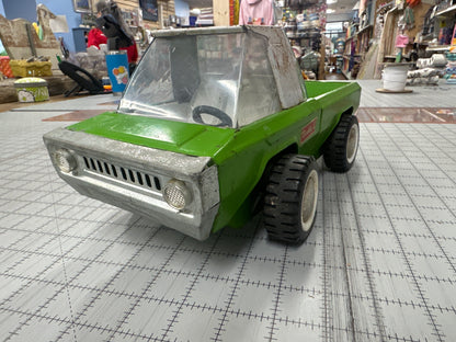 vintage lime green and white Buddy L pressed steel toy truck from the 1960s/1970s era