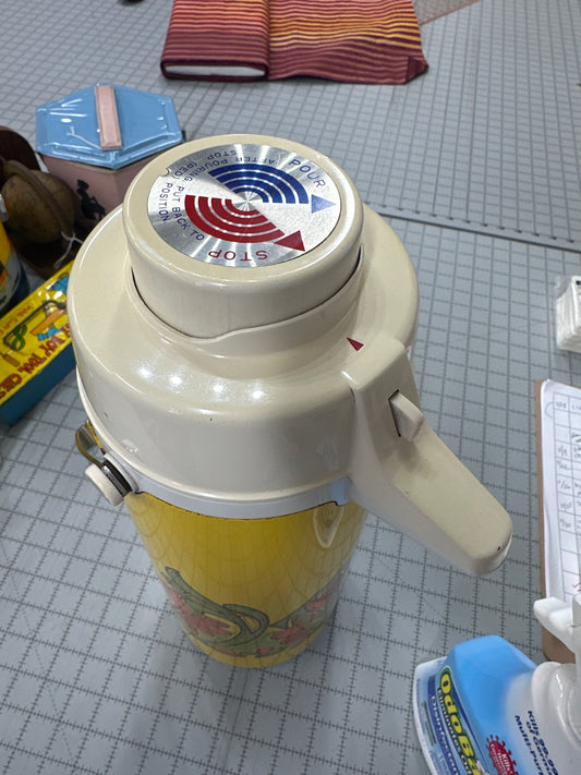 Vintage yellow and white Peacock Vacuum Bottle Company beverage dispenser