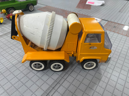 vintage pressed-steel Tonka cab-over concrete mixer truck from the 1960s or 1970
